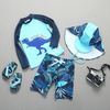 Kids Boys Cartoon Dinosaur Long-Sleeved Sunscreen Quick-Drying Top And Shorts With Hat Bathing Three-Piece Set