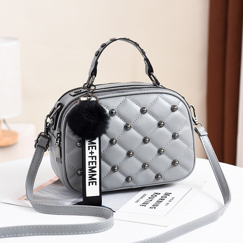 Summer new fashion rivet versatile shoulder bag