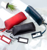 Portable female hand holding cosmetic bag