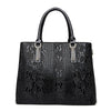 Ladies Handbag In Patent Leather Snake Print