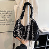 The Fashion Trend Is A One Shoulder Crossbody Bag