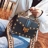 Studded small square bag