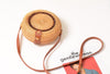 Round rattan woven shoulder bag