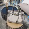 Locked vintage platinum bag