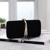 Ou Meimei holding a hard box small square bag dinner bag