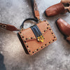 Studded small square bag