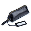 Portable female hand holding cosmetic bag