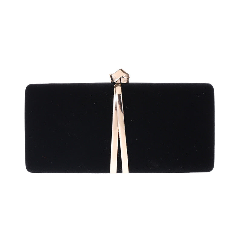 Ou Meimei holding a hard box small square bag dinner bag
