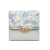 Women's wallet with tri-fold change card bag