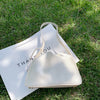 Single shoulder pumping bucket bag