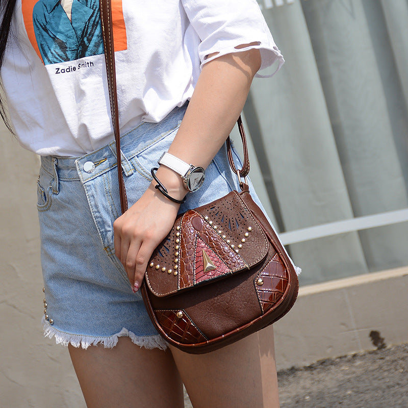 One-shoulder rivet saddle bag