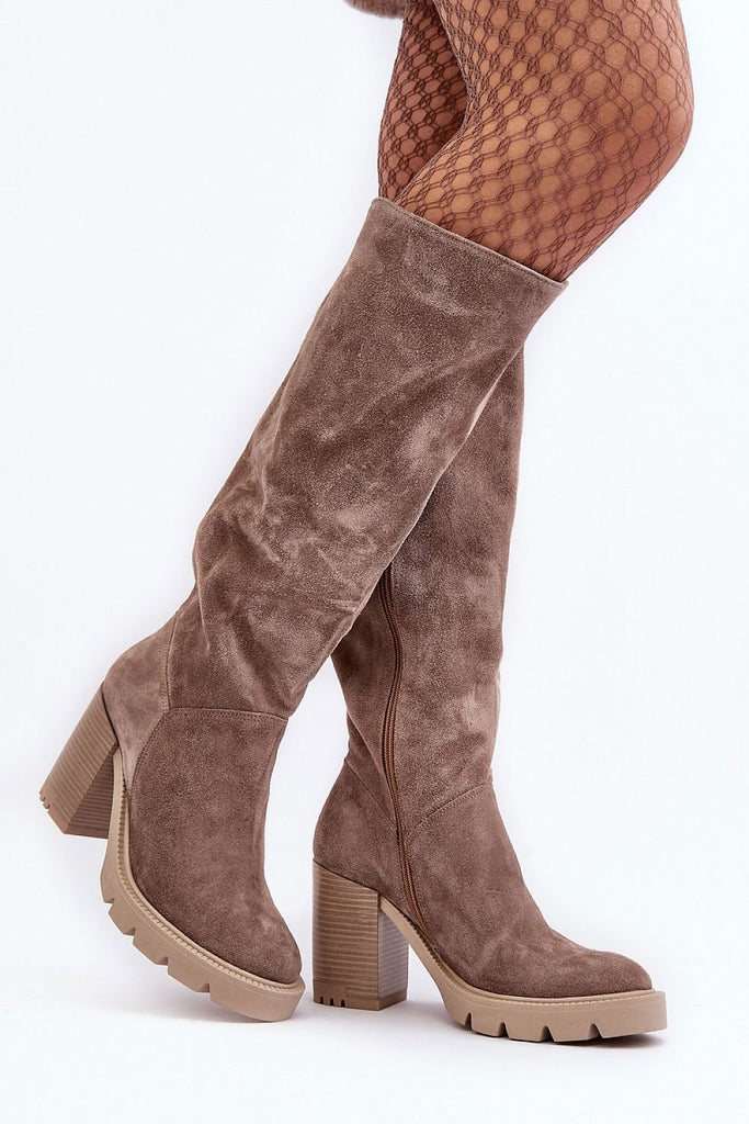 Heel boots Step in style