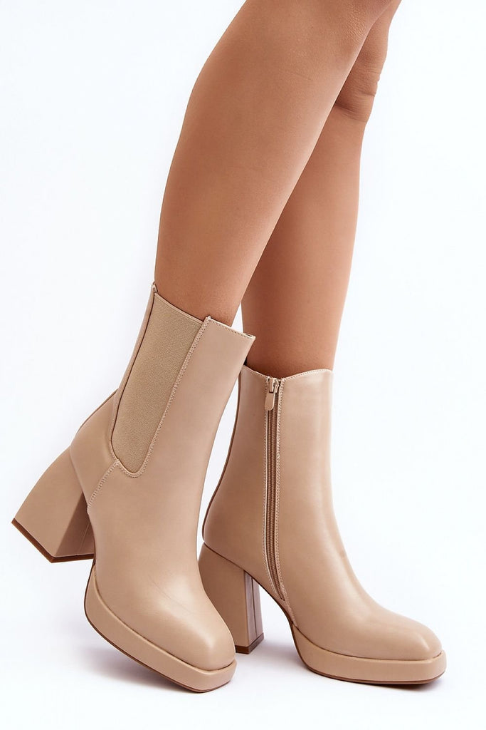 Heel boots Step in style